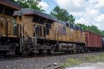 UP 5402 trails on a unit tank car train